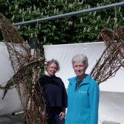 INSPIRING: Juliet Mootz (left) Reparative Artist, and Julie Grainger of Worcestershire Wildlife Trust on the Worcester Plinth with ‘Swift Drift’ the new sculpture.