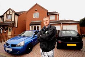 ATTACK: Robert Cox outside his parents’ house in Cobden Avenue, Warndon Villages, after it was targeted by a 15-strong gang armed with bottles, bricks and bats. Picture: Nick Toogood. 11453002