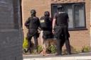 Armed police in Cranham Drive this afternoon