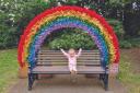 Isla Gibb enjoying the rainbow arch, part of last year’s Droitwich in Bloom