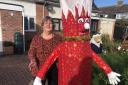 Tina Rimell with her scarecrow called Jack the Christmas Cracker.