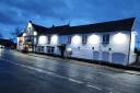 CHANGES: The Red Lion in Holt Heath has now been lit up