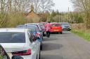'GRIDLOCKED': Cars struggle to get past on the road by Croome Court.