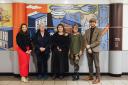 Sam McCarthy (Worcester BID), Fiona Saxon (Worcestershire Community Rail Partnership), Estee Angeline (artist), Maggie Keeble (The Arts Society Worcester) and Stacey Barnfield (The Colour Palette Company) with the bright composition