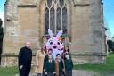 Pictured are (left to right): Rev Gary Crellin, Katy Askew (secretary, Friends of Powick Primary School), pupils Edward Askew and Lydia Crammond, the Easter bunny, pupils Harry Askew and Benjamin Drage and headteacher Martha Worthington.