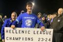 CELEBRATION: Kyle Belmonte celebrates Worcester City becoming champions of the Hellenic League.