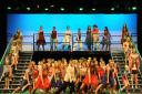 The cast of Footloose take to the stage