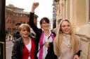 VICTORY: Kim Smith, centre, shows her relief outside Birmingham Crown Court