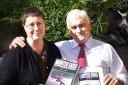 IS THERE SOMETHING OUT THERE? John Hanson and Dawn Holloway pictured with two of the four volumes that they have written and published.