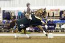 RIDING HIGH: Zoe Sleigh and Light Fantastic in the dressage championships. Picture by Kevin Sparrow.