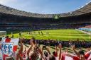 CHEERFUL: England fans in good voice at Estadio Mineirao, despite their team's disappointing performance