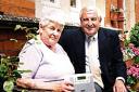Mary Hemming, who has retired from her voluntary role, receives a digital radio as a thank you present from Mike Hardiman, chairman of the Worcester Hospital Contributors Association.