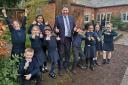 CELEBRATIONS: Headteacher at The River School, Adrian Parsonage, celebrates the positive inspection with pupils