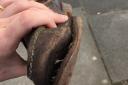 BEYOND REPAIR: A worn-out shoe, belonging to Worcester MP Robin Walker.