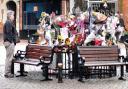 TRIBUTES: The growing pile of floral tributes left in Evesham's Market Square