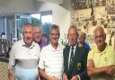 WINNERS: From left to right - Mick Lewis, Martin Westwood, Mick Heard are congratulated by Captain Graham Whitehead and open organiser Will Reading after being named the winning Vale Golf and Country Club team.