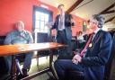MEETING: The Liberal Democrat shadow minister for the West Midlands region John Hemming, centre, with parliamentary candidate Richard Burt, right, at the Bell Inn.