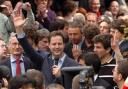 Nick Clegg, leader of the Liberal Democrats, waves to the crowd of supporters