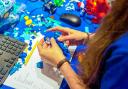 LEGO fans can get paid to play all day if they're successful in applying for the Assistant Master Model Builder roles