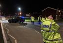 CRASH: The cordon at Windermere Drive in Warndon, Worcester after a crash in which a woman and her dog were struck by a car