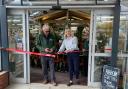 Hannah Warr, director of Laylocks Garden Centre cutting the red ribbon.