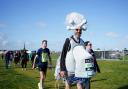 RUNNING:  Marcus Mumford ran the fastest marathon while dressed as a tap