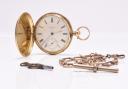 A Robert Roskells 18 carat gold hunter pocket watch which sold for £1,350