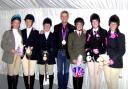 TOASTING SUCCESS: Olympic gold-medallist Carl Hester with members of Malvern Hills Riding Club.