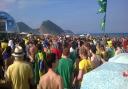 FOOTBALL CRAZY: Brazil fans on Copacabana Beach