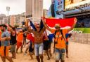 ALL OVER: Holland fans do the conga