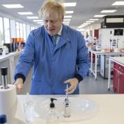 VISIT: The Prime Minister Boris Johnson during a visit to a laboratory on March 6. Picture: Jack Hill/PA Wire