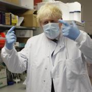 GOVERNMENT: Prime Minister Boris Johnson pictured during a tour of an Oxford laboratory where Covid vaccine research has been carried out. Kirsty Wigglesworth/PA Wire