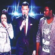 BOTTOM TWO: A tearful Cher Lloyd, left, with X Factor host Dermot O’Leary and Paije Richardson, who was voted off