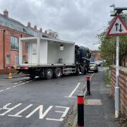 A HGV makes its way down the narrow streets of Barbourne to Gheluvelt Park