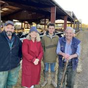 Harriett Baldwin was given a tour of the Richards family farm in Wichenford by owner Dave (left), his father John (right), and his son Max (centre right)
