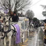 The funeral procession arriving at Our Lady Queen of Peace in St Johns.