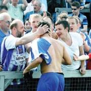 LOYAL FANS: Worcester City supporters show their appreciation at St George’s Lane.