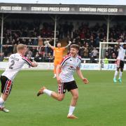 Tom Pugh celebrates opening the scoring for Hereford in their FA Trophy victory against Torquay United