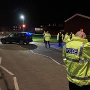 CRASH: The cordon at Windermere Drive in Warndon, Worcester after a crash in which a woman and her dog were struck by a car