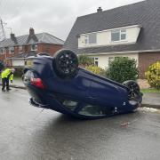The car was flipped over at around 7.20am this morning,  causing the street to be closed for around three hours