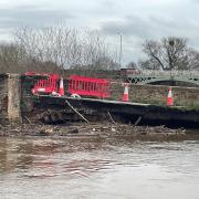WOUND: Driftwood and other debris piled against the collapsed section of Powick Old Bridge, taken on  Sunday 25/2/24