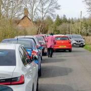 'GRIDLOCKED': Cars struggle to get past on the road by Croome Court.