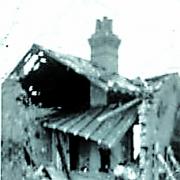 DEVASTATION: The scene after the German bomb fell on 5 Highland Road.