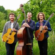 Remi Harris (right) is joined by double bassist Tom Moore and rhythm guitarist Chris Nesbitt