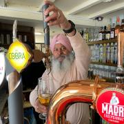 FUTURE: Jaswender Singh behind the bar of the revamped Red Lion at Witley Road in Holt Heath near Worcester