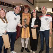 Winning team Paul and Ali Chester and Dale and Jodie Godliman with Henry VIII quizmaster Jon Fraser