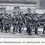 A photograph from the Berrow’s Journal Pictorial Supplement for mid-August 1914, captioned “Worcester Territorials.” The 8th Battalion of the Worcestershire Regiment march past the Shirehall at Worcester.