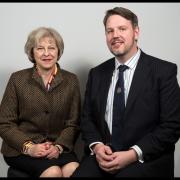 PRESSURE: Councillor John Campion, right, with Home Secretary Theresa May.