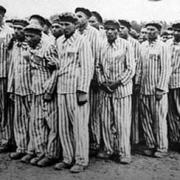 PRISONERS: Jewish people waiting to be shot during the Holocaust.