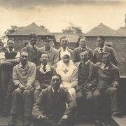 Fred Norris sitting to the right of the nurse at Wordsley Hospital, Dudley, which was then in Worcestershire